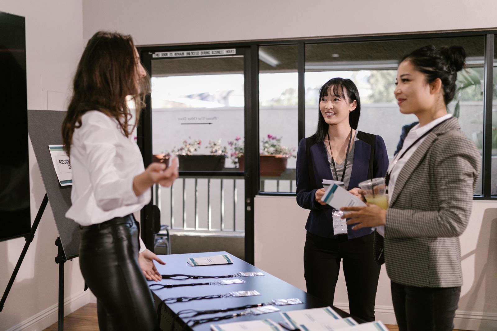 Registration desk in operation at a conference venue